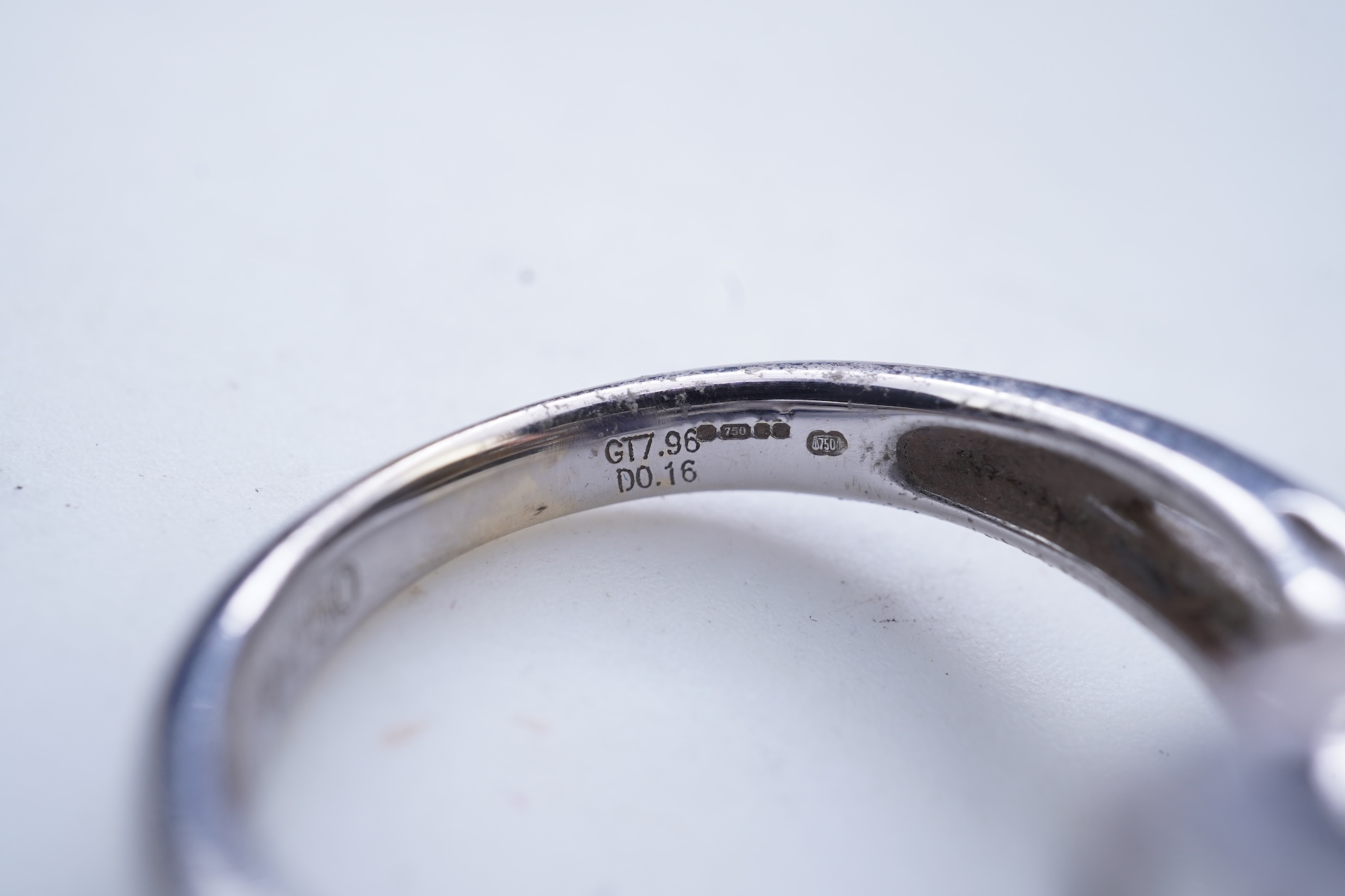 An iolite and diamond ring